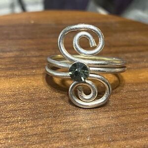 Women’s silver‎ colored ring size 9